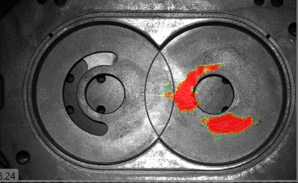 A heat map showing surface damage on a metal part detected with AI